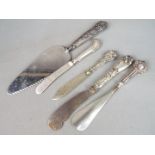 Five pieces of silver handled cutlery