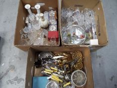 A mixed lot to include ceramics, glassware, metalware and similar, three boxes.