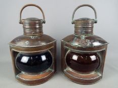 Nautical - A pair of copper, ship's navigation lights, approximately 39 cm (h) including handles.