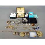 Silver - a quantity of silver jewellery to include a ring, brooches,