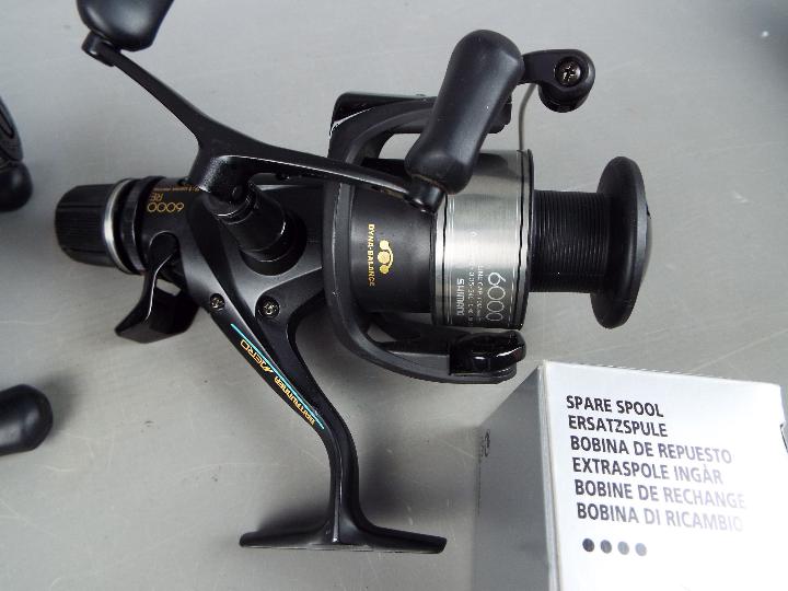 Angling - two new Shimano Big Baitrunner Jero 6000 RE fishing reels with two spare spools and a 12 - Image 3 of 5