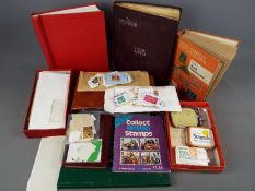Philately - A quantity of UK and foreign stamps, loose and in albums, first day covers and similar.