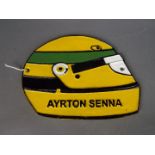 A cast Ayrton Senna sign approx 17 cm x 22 cm