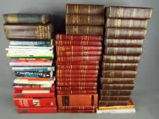 A large quantity of hardback books to include Dickens, educational and similar, three boxes.