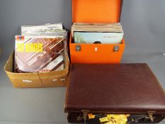 A collection of 33 RPM vinyl records to include ABBA, The Beatles (Please Please Me + Help!),