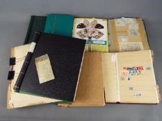 Philately - A collection of stamp albums containing predominantly foreign stamps.