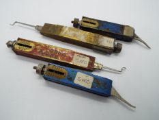 Four vintage tension gauges by G.E.C and similar.