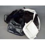 Handbags - a Taurus brown leather handbag containing a brown umbrella by Fulton,