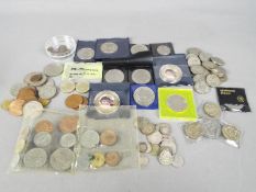 A collection of pre-decimal coins to include silver 1d, 2d, 3d, 4d, also shillings, florins,