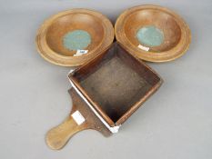 Three wooden collection dishes