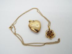 A 9ct gold stone set, flowerhead pendant on fine chain, approximately 2.