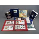 Philately - Two suede Benham binders containing a quantity of silk first day covers,