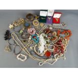 A collection of predominantly modern costume jewellery including bangles,