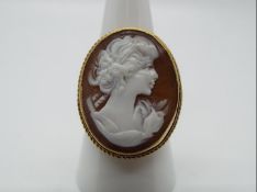 A 9ct yellow gold cameo ring, size R, head of ring measures approximately 2.6 cm x 2.