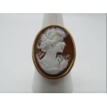 A 9ct yellow gold cameo ring, size R, head of ring measures approximately 2.6 cm x 2.