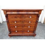 A substantial Victorian mahogany chest of four graduated drawers,