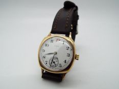 A 9ct gold cased Elgin, quartz wristwatch having subsidiary seconds dial, on leather strap.