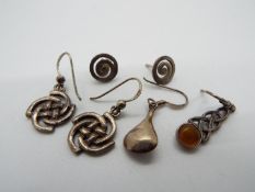 Two pairs of silver earrings plus 2 single silver earrings all marked 925, total weight approx 7.
