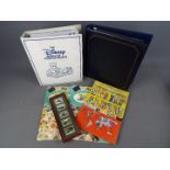 Philately - A binder 'The Disney World Of Postage Stamps' extensively filled,