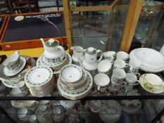 A quantity of Royal Doulton dinner and tea wares in the 'Tapestry' pattern,