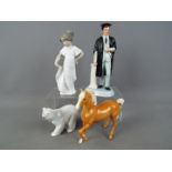 A Royal Doulton figurine 'The Graduate' # HN3017, a Beswick palomino horse,