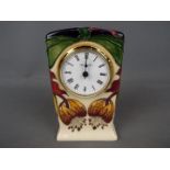 A Moorcroft Anna Lily clock,