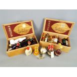 A collection of various miniature / taster bottles of alcoholic drink to include whisky, brandy,