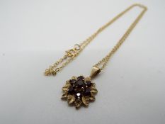 9 ct Gold - a 9ct gold necklace with a 9ct gold cluster pendant, stamped 375, approx weight 2.