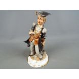 A good quality capodimonte figurine depicting a lawyer, signed,