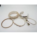 Silver Jewellery - four silver torque bangles (stamped) and one rolled gold bangle