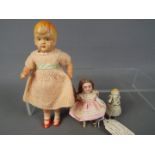 German Doll House Dolls - a German Doll House doll with ceramic painted face, real human hair,