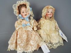 Catterfeldeer Puppenfabrik - a pair of ceramic faced dolls to include a Catterfelder Puppenfabric