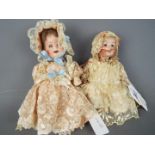 Catterfeldeer Puppenfabrik - a pair of ceramic faced dolls to include a Catterfelder Puppenfabric