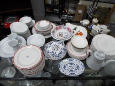 A mixed lot of dinner wares to include Crown Ming, Crown Devon, blue and white and similar.