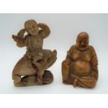 Two Oriental soapstone carvings, one depicting the Laughing Buddha, largest approximately 10 cm (h).