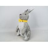 A fabric shelf rabbit,