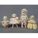 Penny Dolls - a collection of four Made in Japan bisque Penny Dolls ranging in size from 13 cm to 9