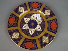 A Caverswall china plaque in the Harmony design,