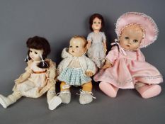 Eff an Bee Dolls - a collection of four dolls to include a Eff an Bee boy baby doll with jointed