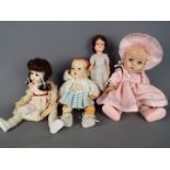 Eff an Bee Dolls - a collection of four dolls to include a Eff an Bee boy baby doll with jointed