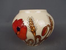 A Moorcroft Harvest Poppy vase,