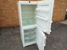 An upright fridge / freezer,