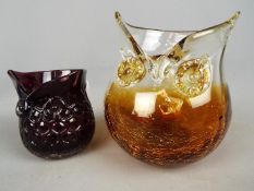 Two glass owls one in the form of a jug approx 10 cm (h) and one in the form of a vase approx 17 cm