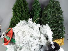 A box of Christmas trees including flat back wall hanging Christmas trees, stands and similar.