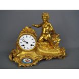 A good, floral and rococo-styled ormolu French mantel clock,