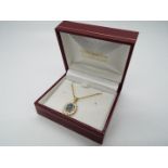 9 ct Gold - a 9ct gold fine twist rope necklace with a 9ct gold pendant set with Opal, stamped 375,