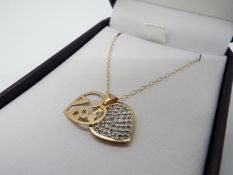 A heart shaped 18 necklace stamped 375, approx weight 1.