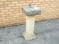 A garden sundial measuring approximately 97 cm (h).