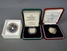 Three silver proof coins comprising a 1992 Piedfort 10p, a 1997 £2,