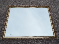 A large wall mirror, approximately 87 cm x 112 cm.